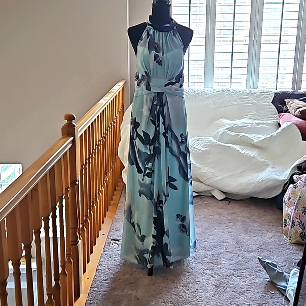 Never Worn.  Formal dress size 6